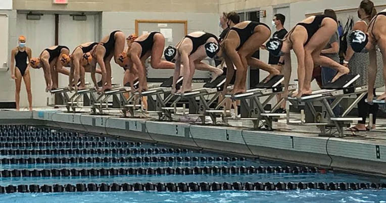 High school swimmers today beat past American record times