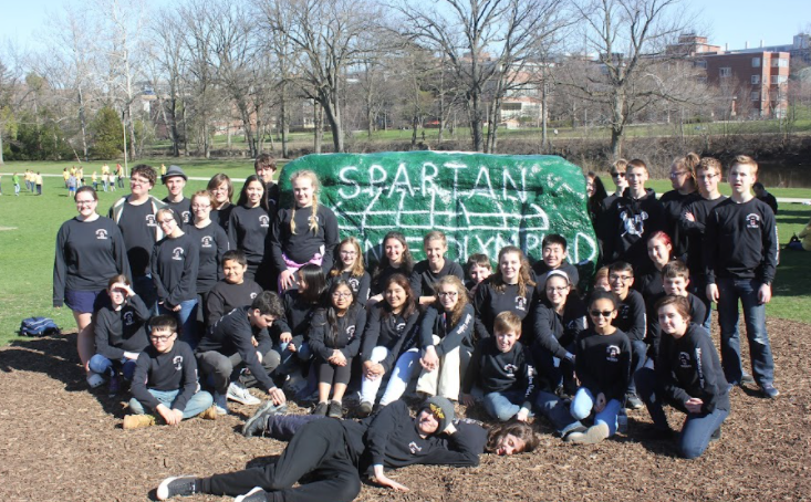 Members of West Ottawa’s Science Olympiad team pose at The Rock after competing at regionals