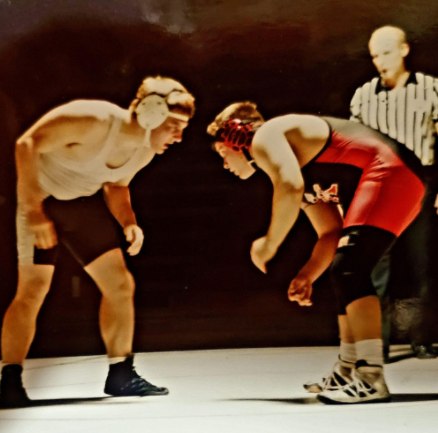 Ryan Lancaster facing his opponent during a wrestling match.