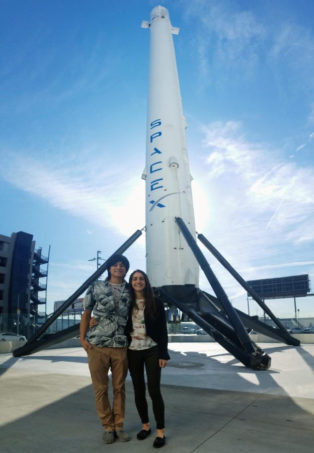 Alan Yamamoto on his last day of work posing next to the first booster SpaceX landed.