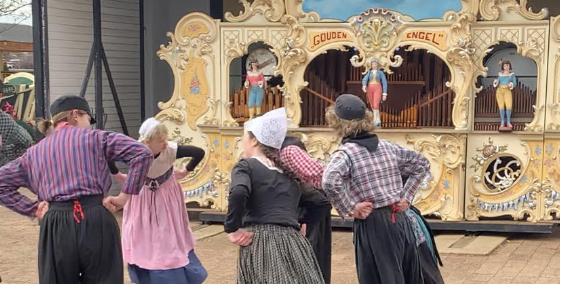 Soph. Caedmon Kephart performing a Dutch dance at the Dutch Village soft open