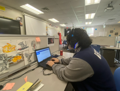 Students in the Entrepreneurship and Global Business class at CTC work on their computers