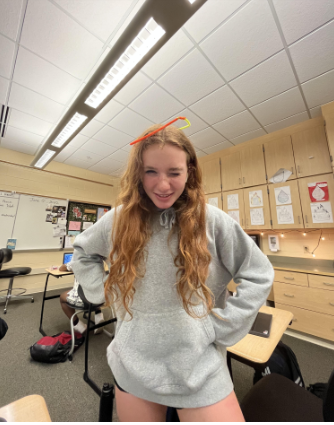 Fr. Chelsea poses for a picture in English class with her beautiful pipe cleaner crown. 