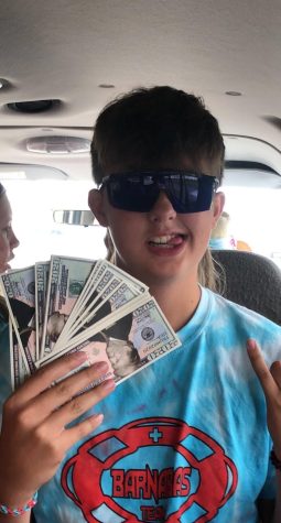 Jr.  Colin Stegenga showing off his large amount of money.