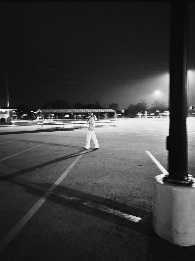 Walking alone, 16 year old girl, tries to locate her car in a dark parking lot.