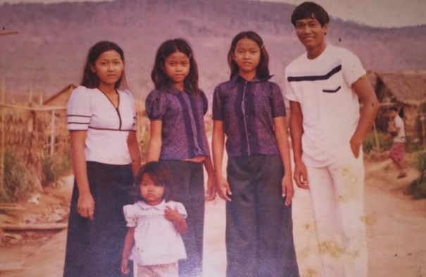 Sophea Leang (middle) pictured with her family in settled times before their emigration.