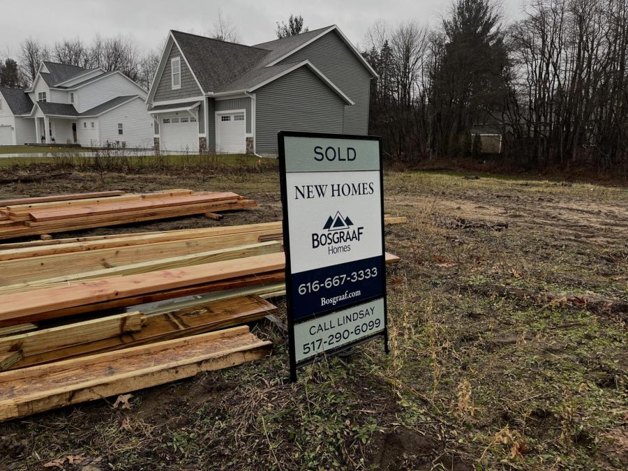 Recent sold property sign in a Holland neighborhood.