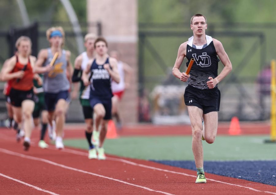 Cole+leading+the+3200+meter+relay+at+the+2022+Regional+meet+for+the+Panthers.