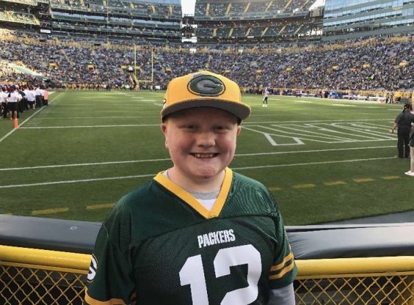 Jr. Gerrit Corell near the end zone at Lambeau Field at the Packers game