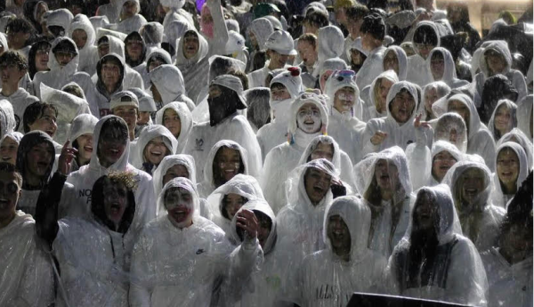 Students turned out for the homecoming game despite the rain.