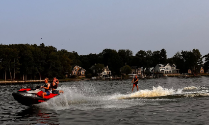 Sr. Eliot Dozeman and friends enjoy some recreation on the water--safely.
