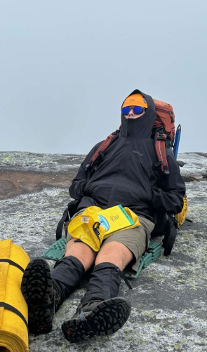 Holden Hollingsworth takes an essential sleep break durin a hiking excursion.