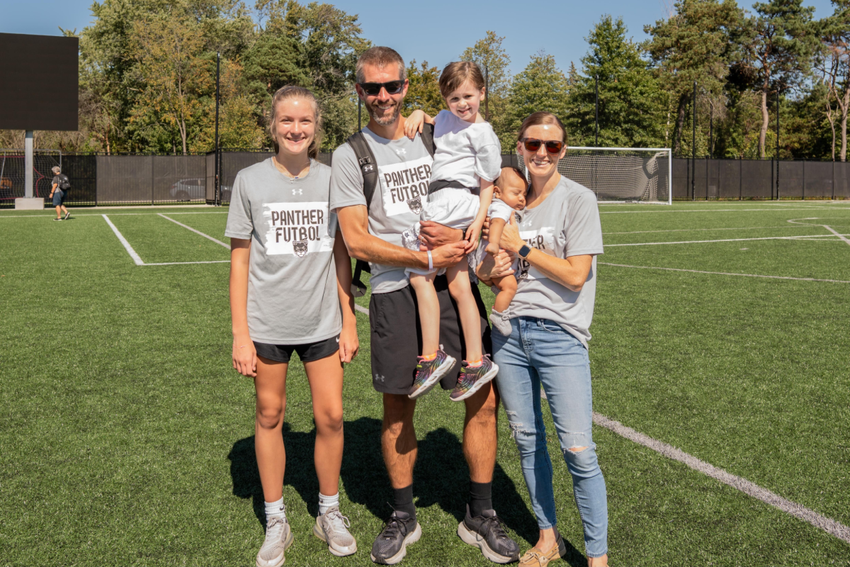 Tyler Robinson and his family: Taken by Laura Veldhof at the West Ottawa High School Soccer Stadium

